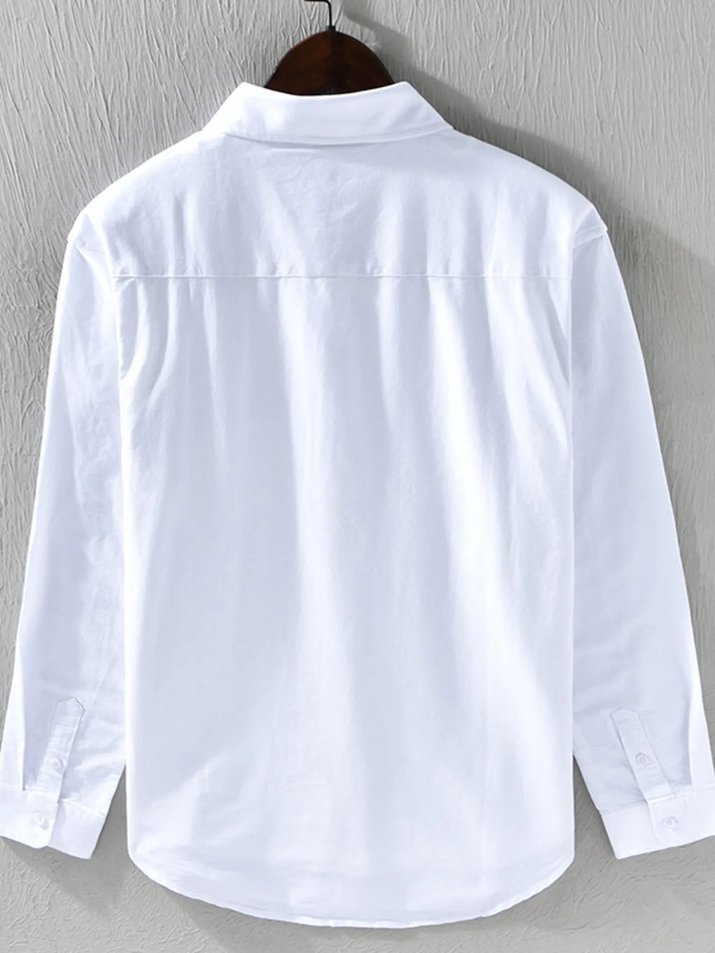 Men's button-down shirt in white, back view, button placket and collar