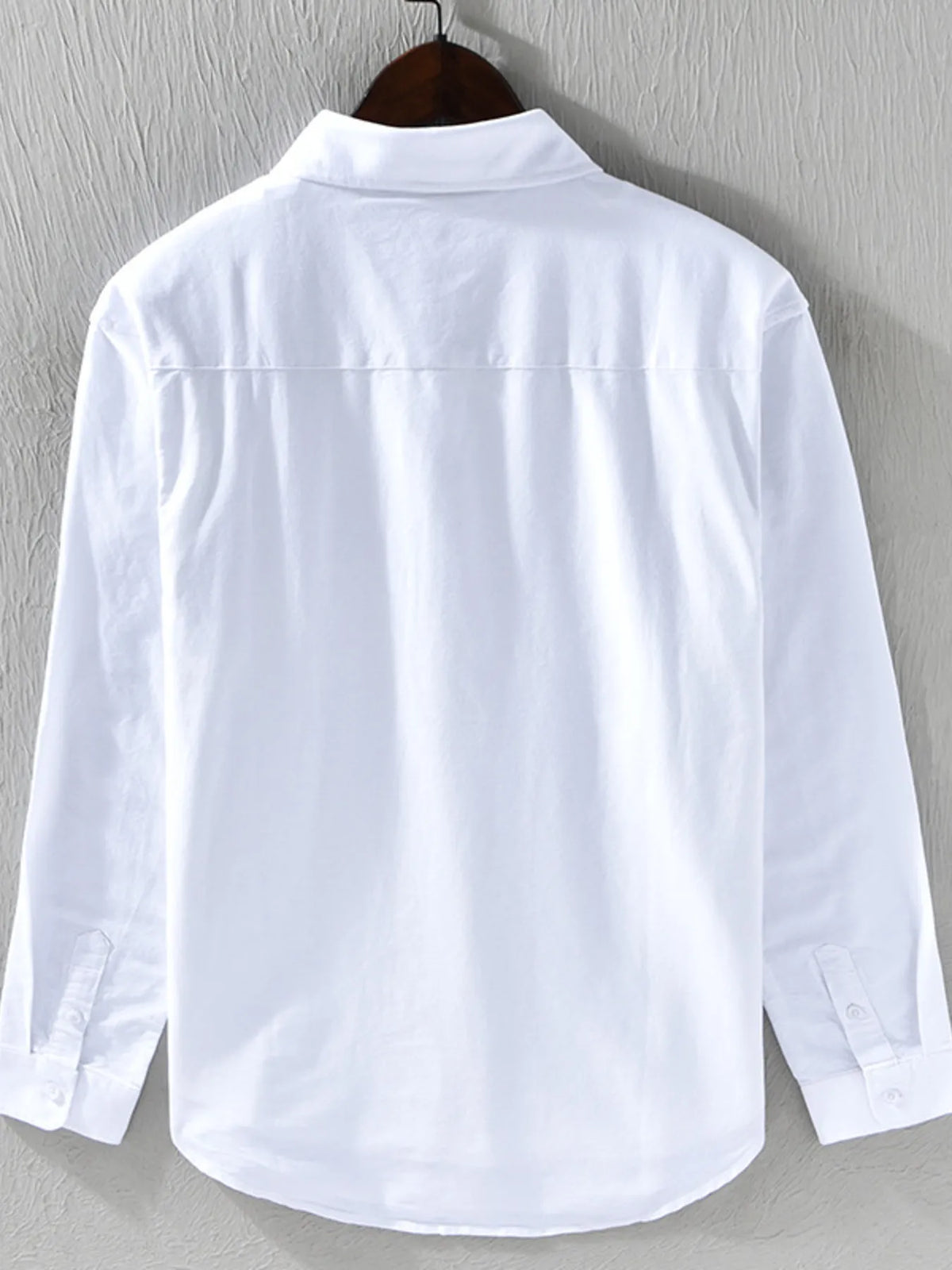 Men's button-down shirt in white, back view, button placket and collar
