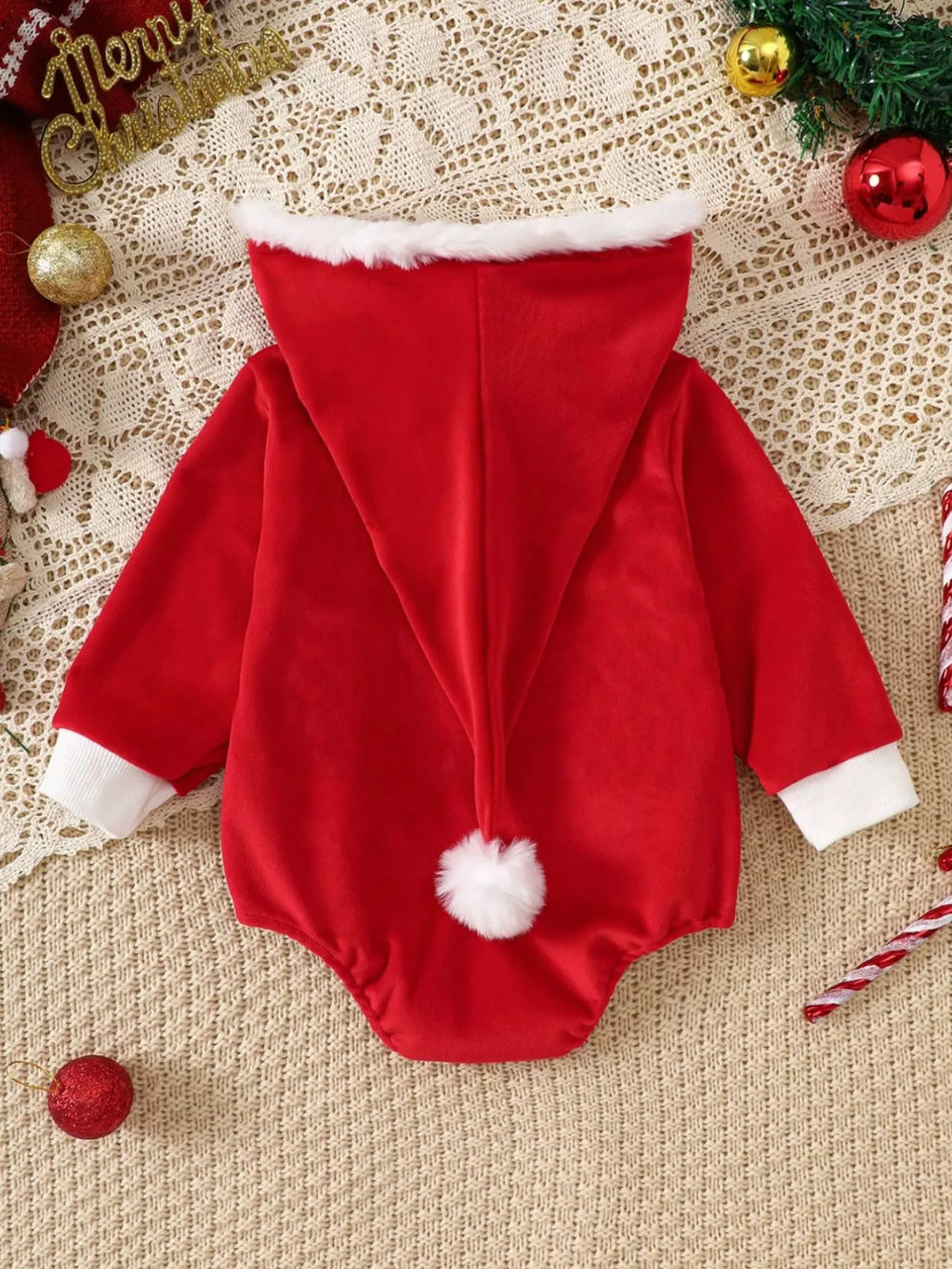 Children’s red Santa hooded romper with white cuffs and pom, buttoned bodysuit