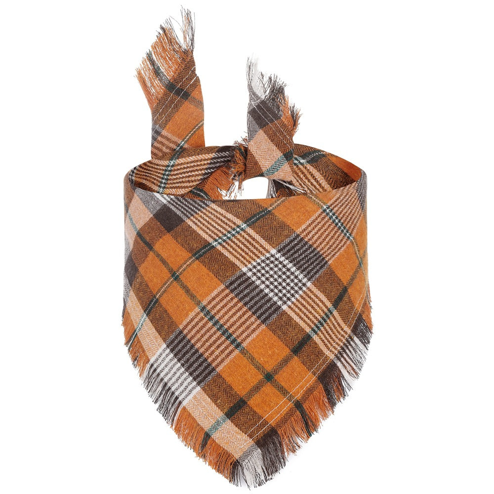 Triangle plaid dog bandana with tassel edges, orange and brown