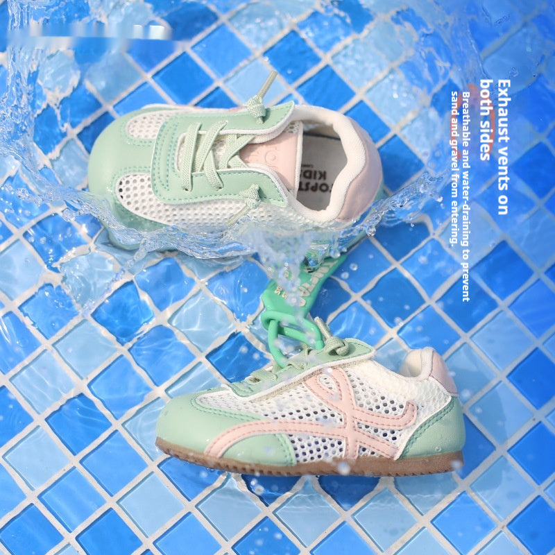 Mint green toddler lace-up sport shoes with pink side logo and light soles