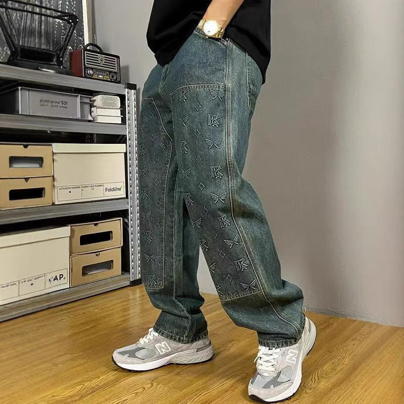Men's loose straight-leg denim trousers in blue-green, vintage wash, allover print