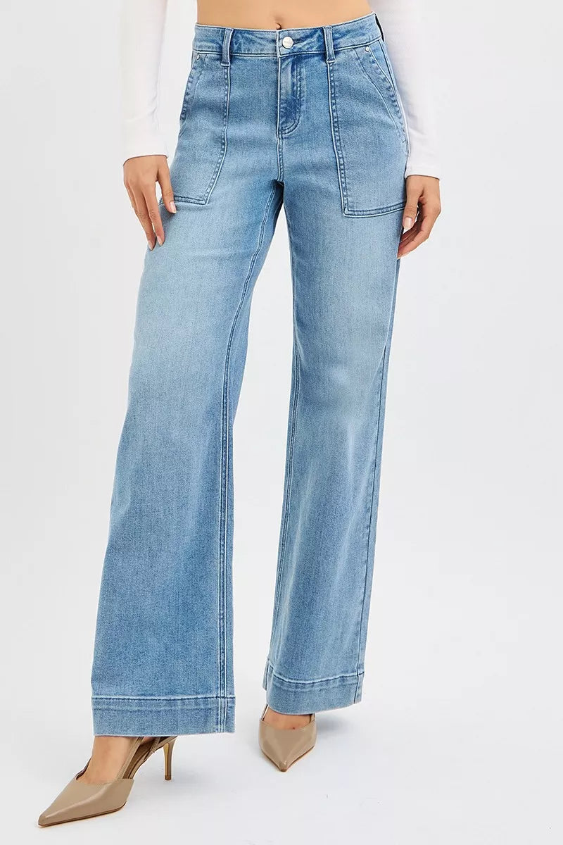 Medium wash high-rise straight-leg jeans, front pockets and five-button closure