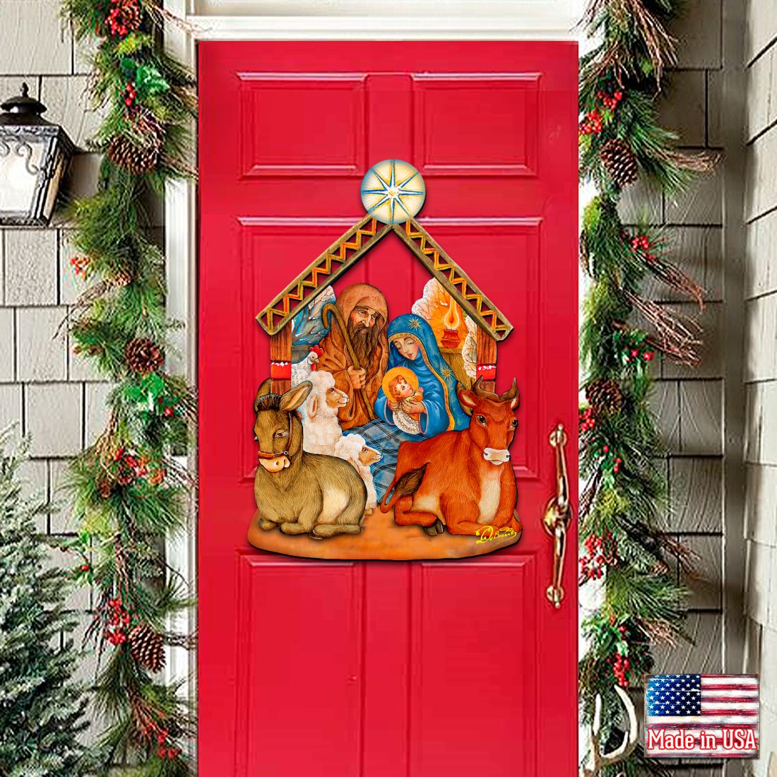 Nativity wooden door decor with manger scene, Mary and Joseph, animals, and star topper