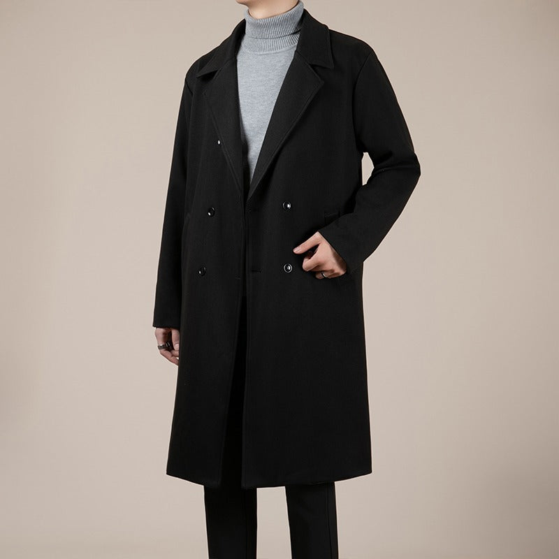 Black mid-length wool trench coat with open notched lapels and buttoned long sleeves