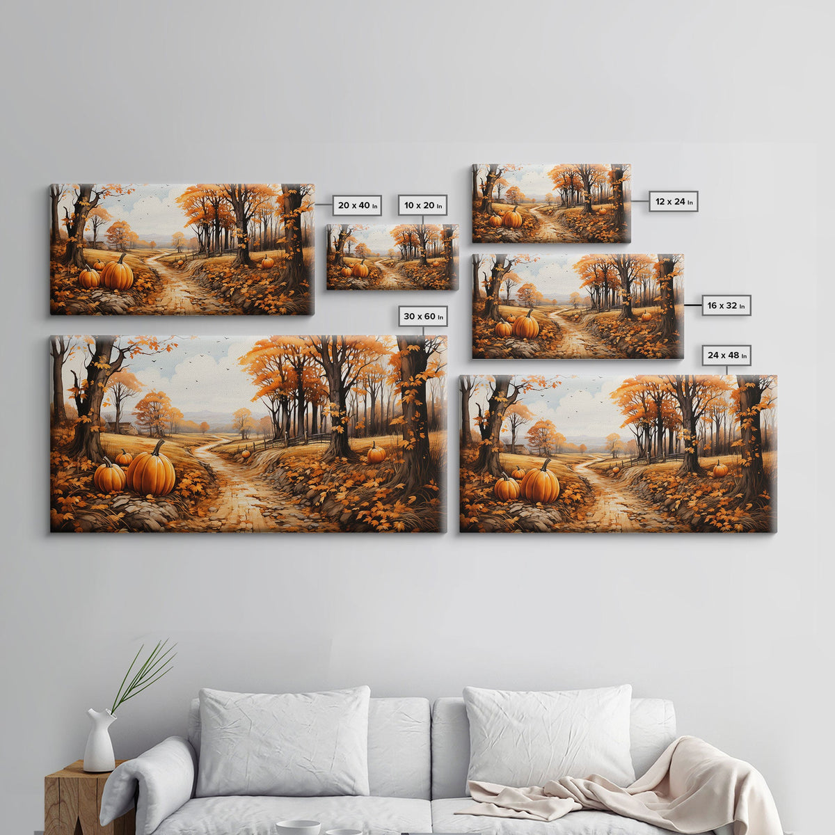 Set of fall landscape canvas prints with pumpkins and autumn trees on a wall
