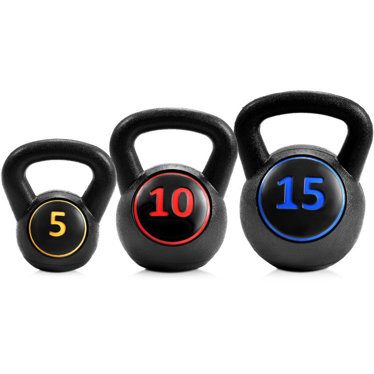 Set of three black kettlebells with numbered weight markers 5, 10, 15