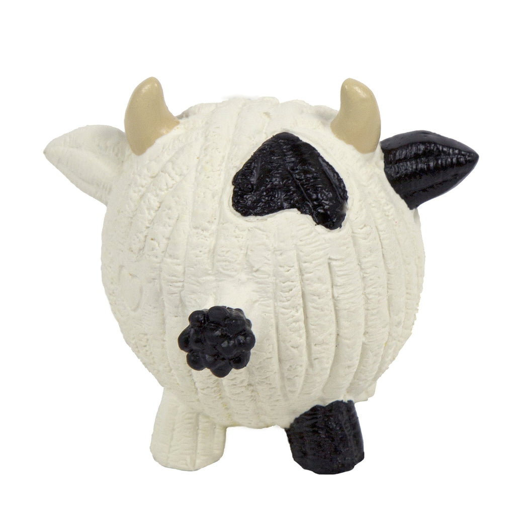White cow latex dog ball toy with black spots and textured stitched surface