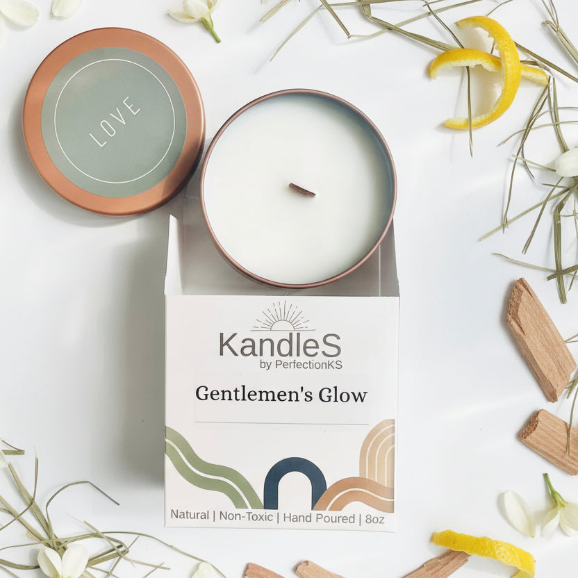 Soy candle in round tin with 'LOVE' lid; wick centered in white box