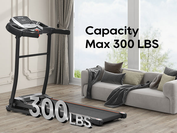 Black folding treadmill with wide running deck and console display showing max capacity