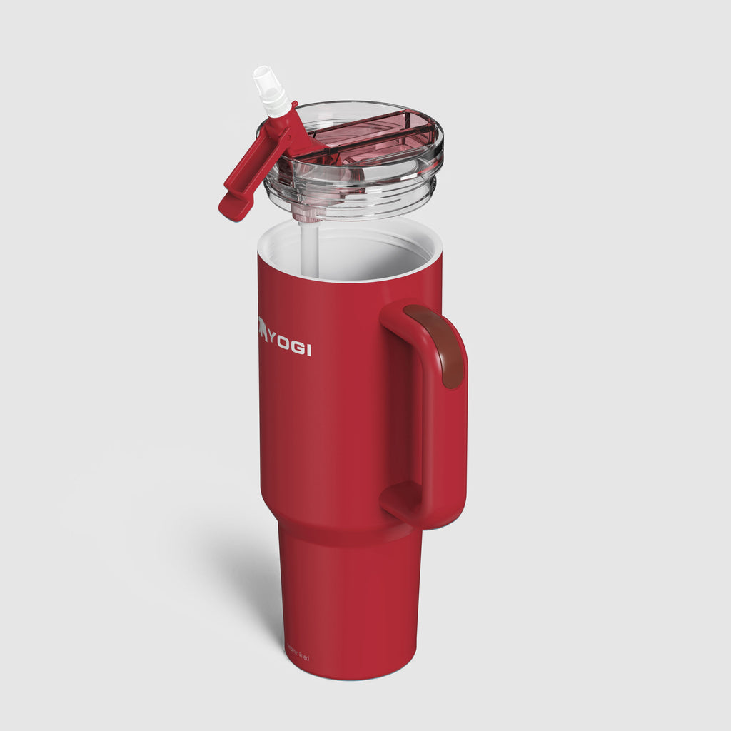 Red ceramic-lined Evolution tumbler with clear lid open and side handle; YOGI branding.