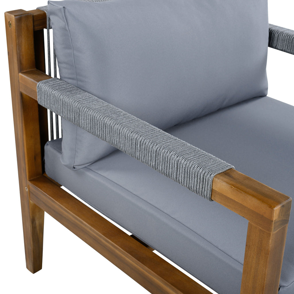 Outdoor chair arm and seat cushion in gray with acacia wood frame