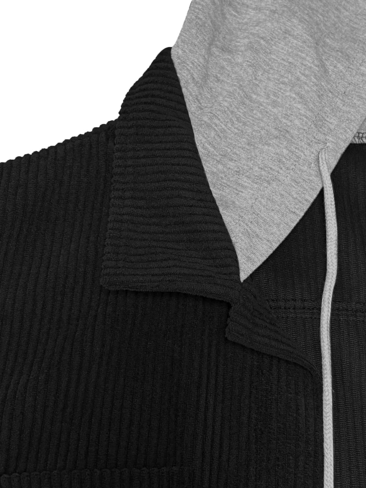 Black corduroy jacket close-up of hood lining and textured fabric