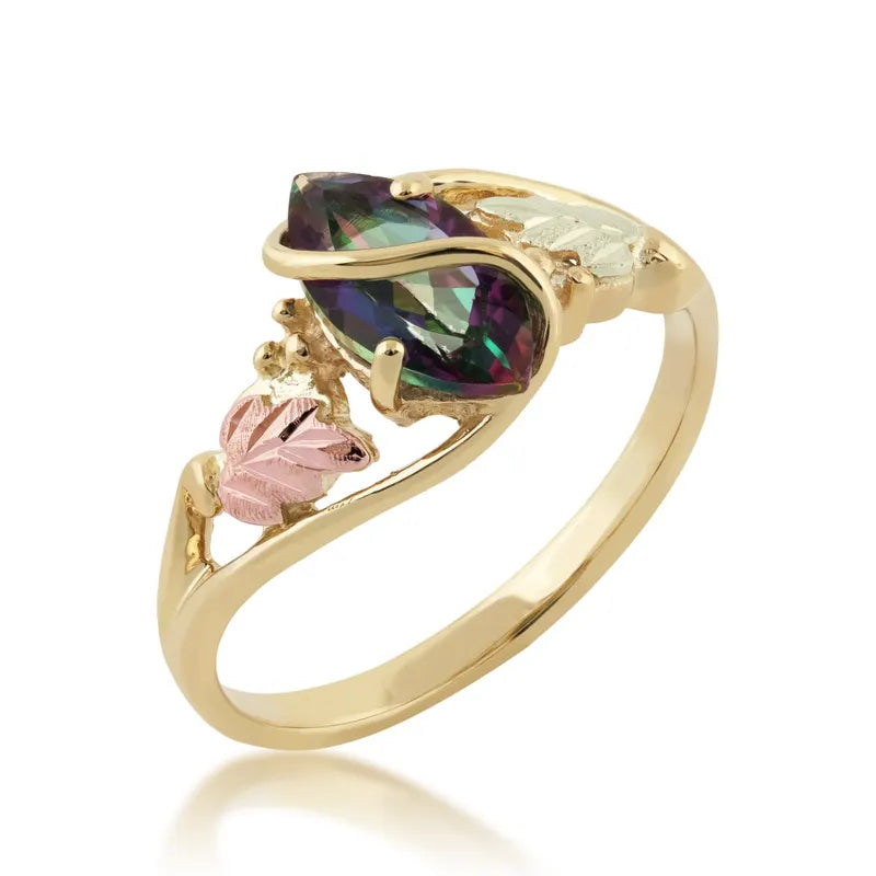 Yellow gold ring with multicolor marquise center stone, pink leaf and leaf-texture detail