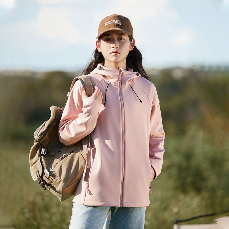 Light pink waterproof soft shell jacket with hood, full-zip front, and drawstring hem