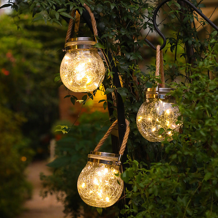 Crackle glass jar globe string light with gold caps and hanging cords