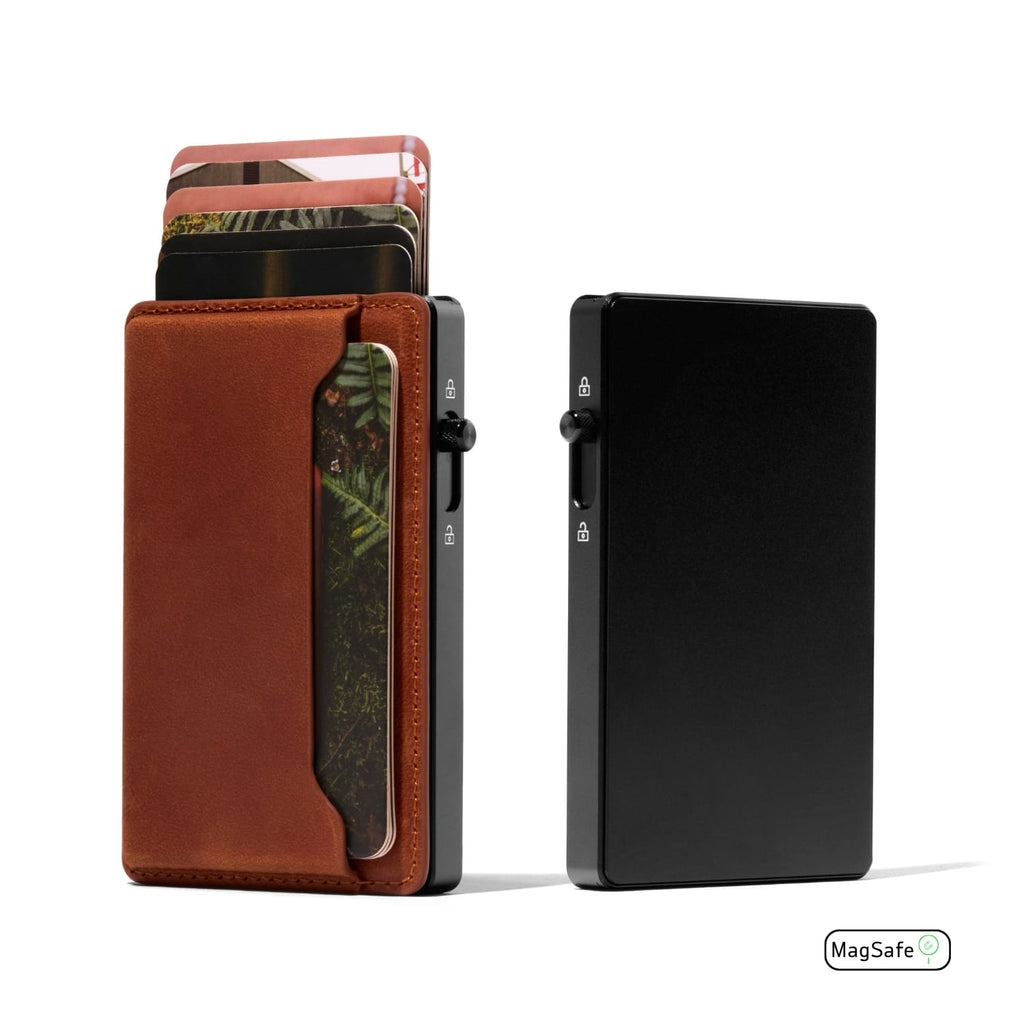 Mod wallet with brown leather front and black metal back plate, side view