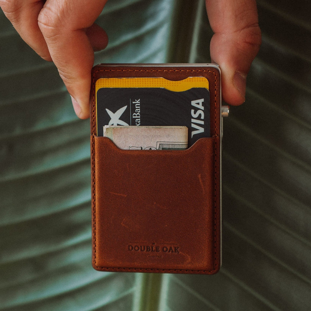 Brown leather mod wallet front view with card slots and gold-tone trim