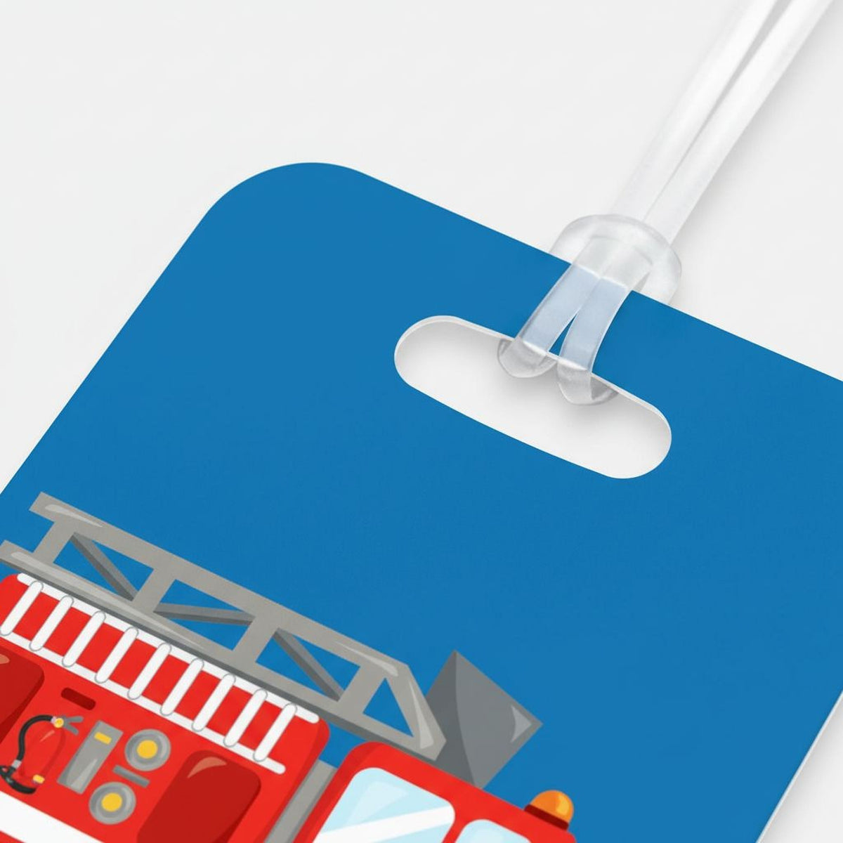 Rectangle name tag corner with blue background, clear loop, and red fire truck