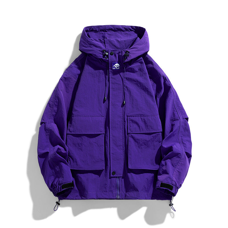 Purple hooded zip-up work jacket with chest pockets and adjustable drawstring hood