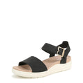 Women's black open-toe sandal with ankle strap and gold-tone buckle on white sole