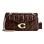 Quilted shoulder bag in chocolate brown with chain strap and turn-lock front clasp.