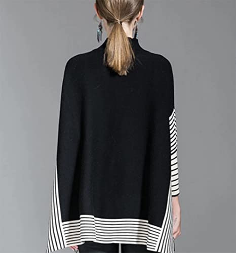 Women's black poncho sweater back view with mock neck and striped cuff details