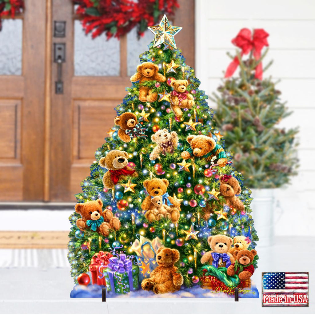 Teddy bear Christmas tree yard sign with glowing ornaments, gifts, and star topper near porch