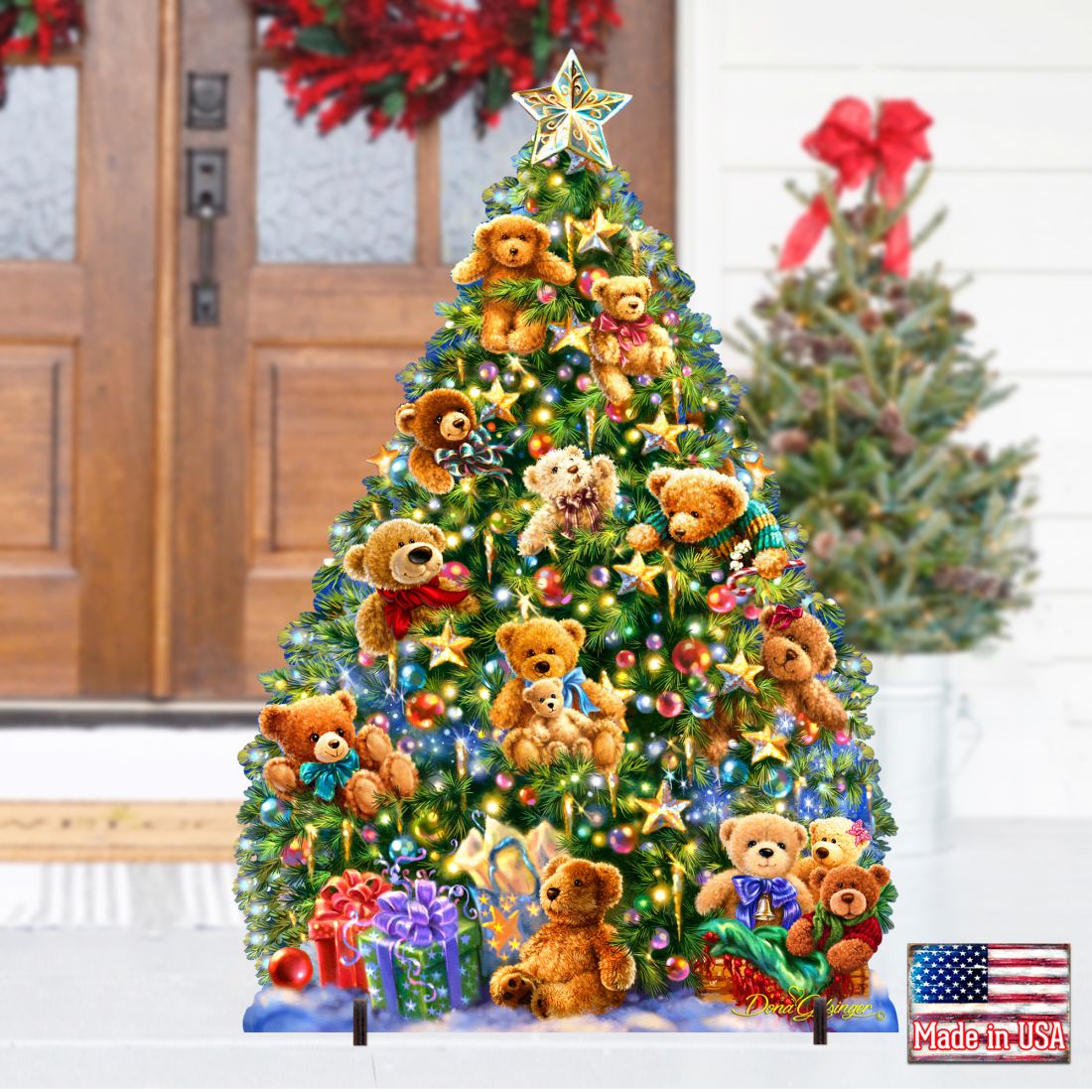 Teddy bear Christmas tree yard sign with glowing ornaments, gifts, and star topper near porch