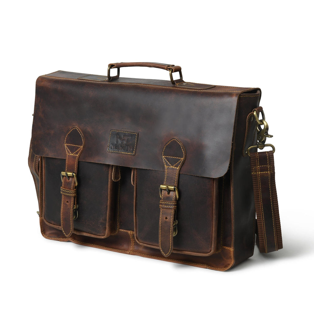 Brown leather briefcase with flap closure, top handle, and side strap hardware.