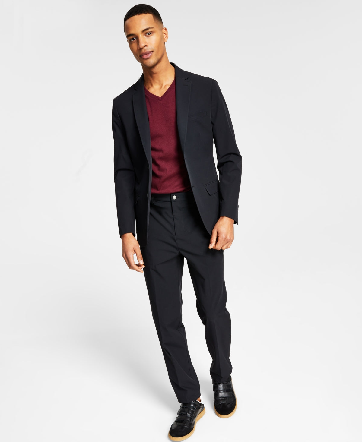 Men's black slim-fit sport coat with notch lapels and matching trousers, burgundy top