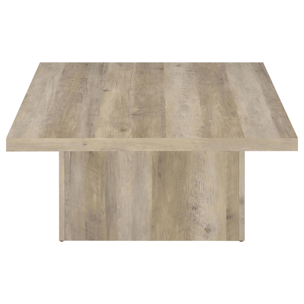 Distressed pine square coffee table with visible frame and straight legs