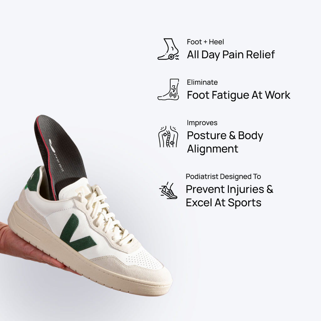 White athletic shoe with orthotic insole insert and red edge trim