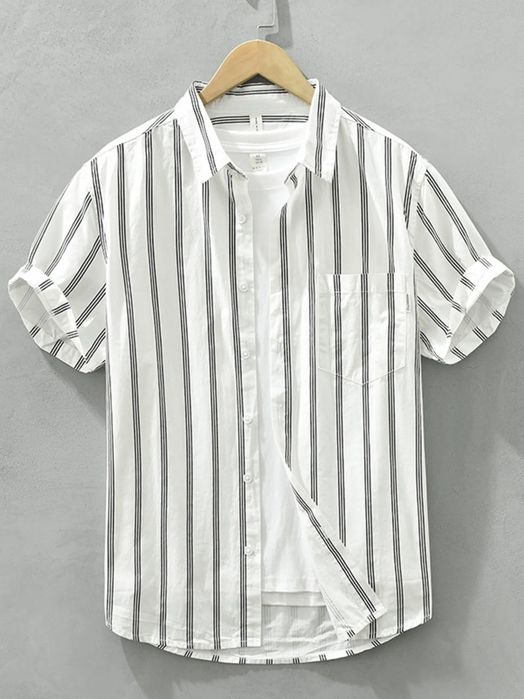 Plus-size striped short-sleeve button-up shirt, white with vertical black stripes