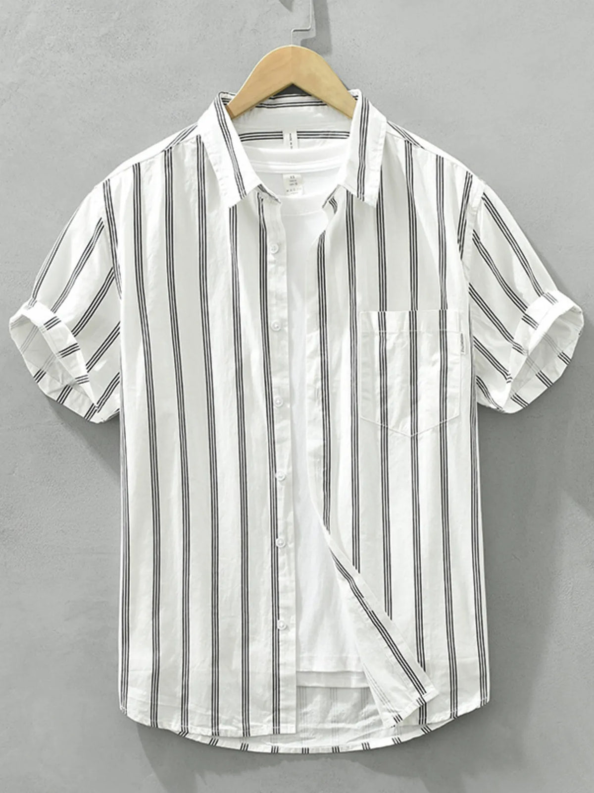 Plus-size striped short-sleeve button-up shirt, white with vertical black stripes
