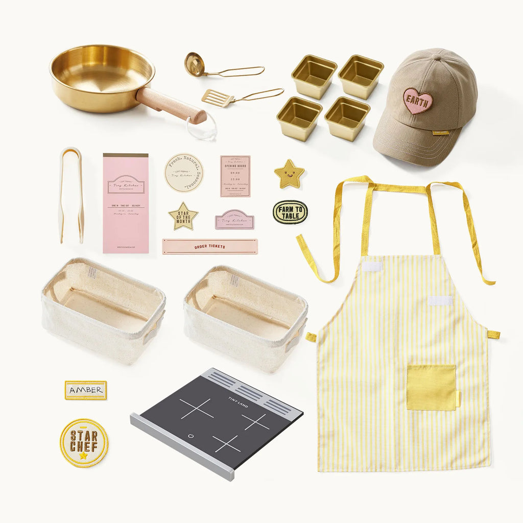 Children's play kitchen accessory set: gold pan, utensils, hat, striped apron