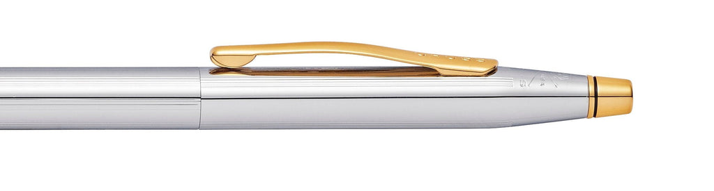 Pen and pencil set, close-up of silver barrel with gold clip and ring