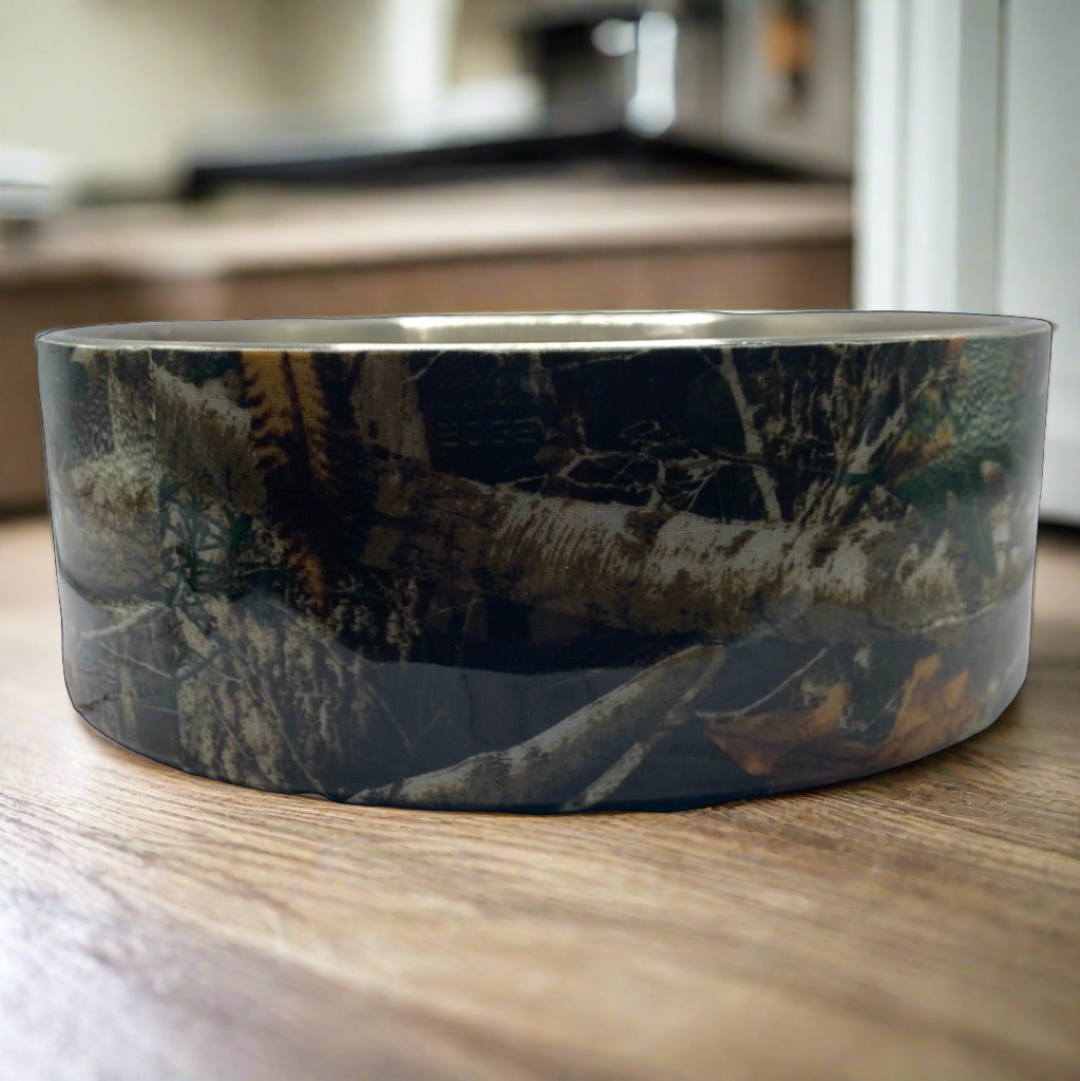 Stainless steel dog bowl with camo pattern, 64 oz capacity.