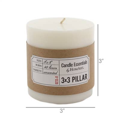 Ivory 3x3 pillar candle with brown label, with size markings 3" height and width.
