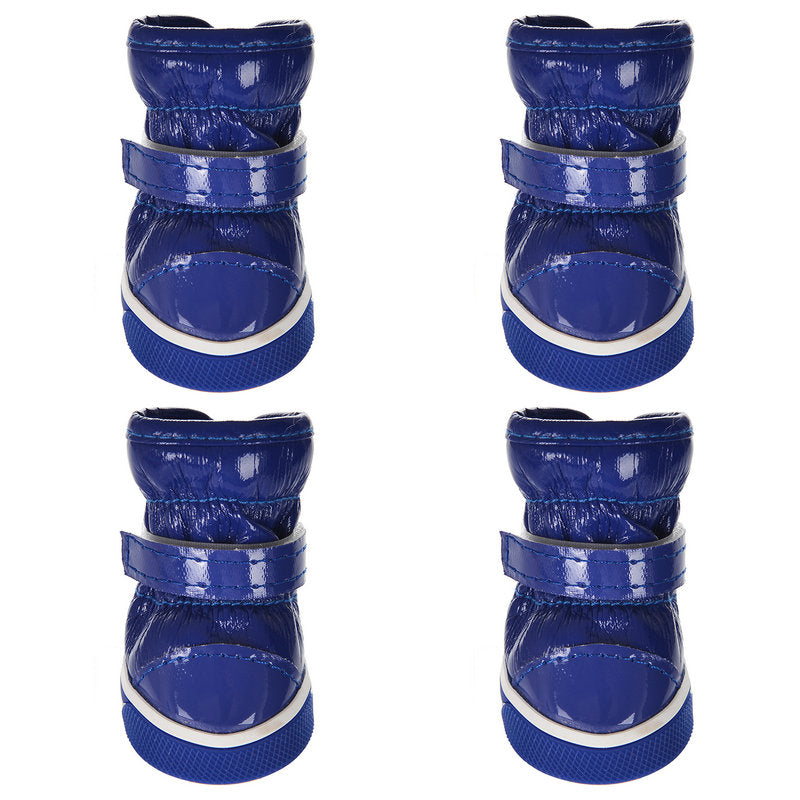 Blue pet ski boots shown from multiple angles, with white-trim rubber soles and hook straps