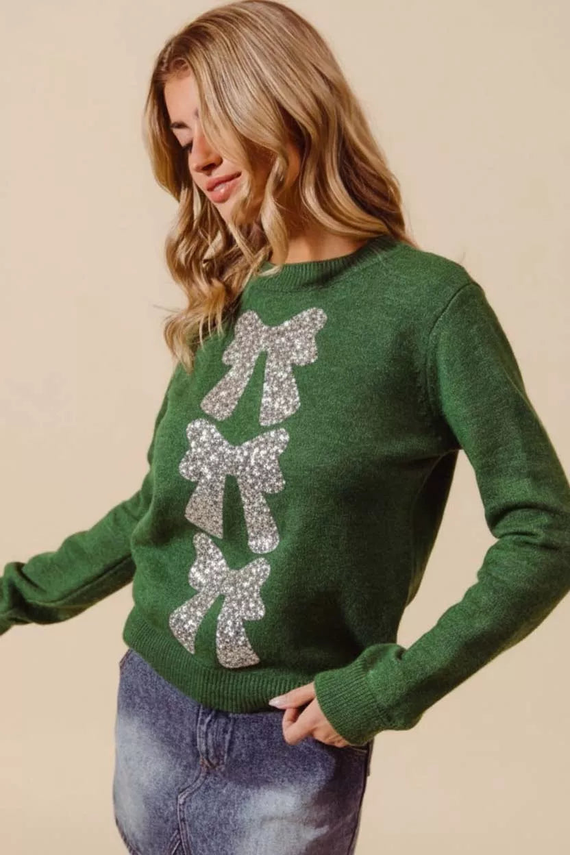Hunter green Christmas sweater with silver sequin bow-ribbon front detail