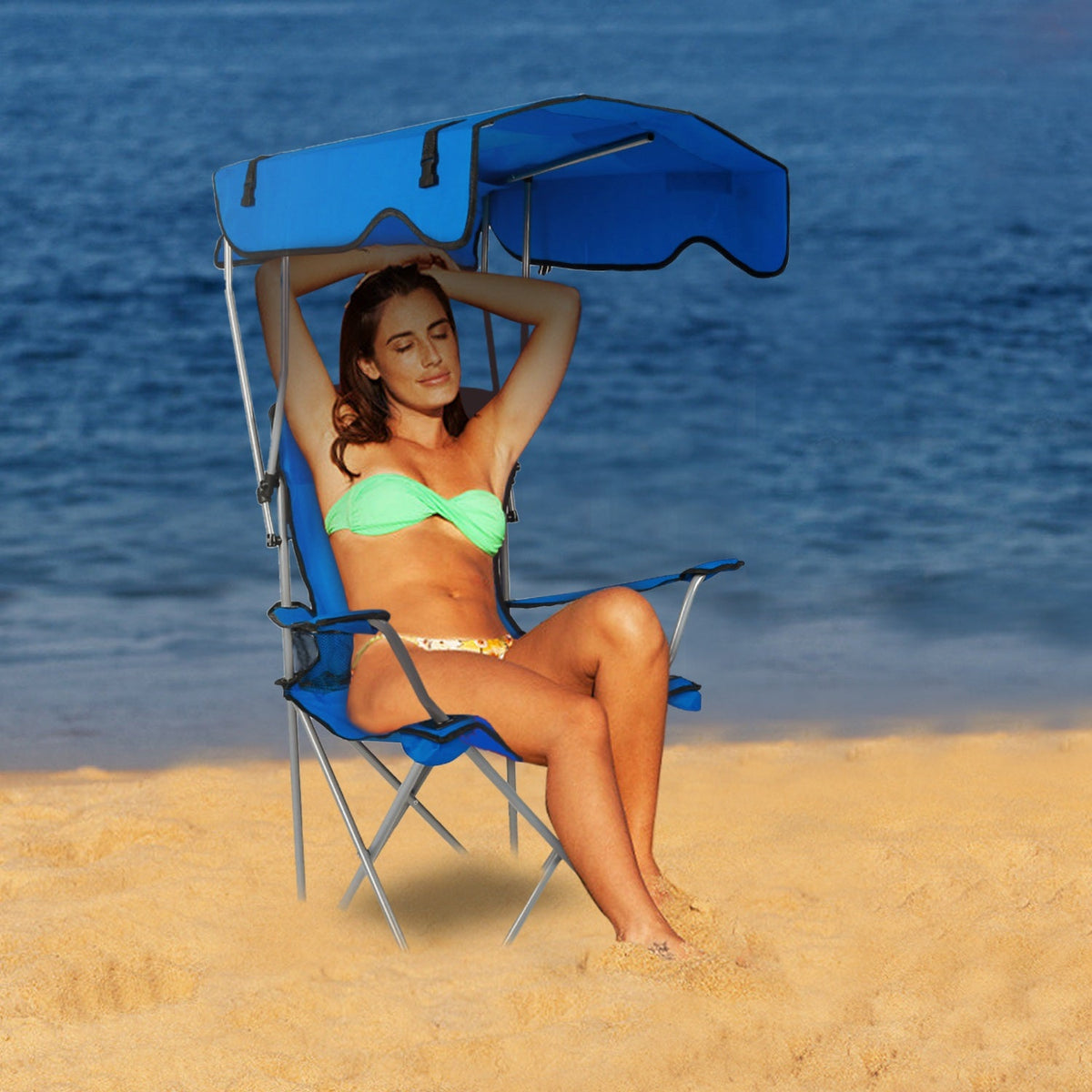 Blue folding beach canopy chair with overhead sunshade and padded seat