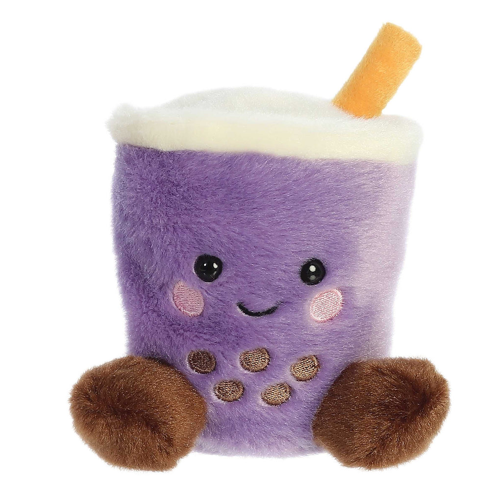 Purple plush boba drink toy with tan arms, cream lid, and orange straw