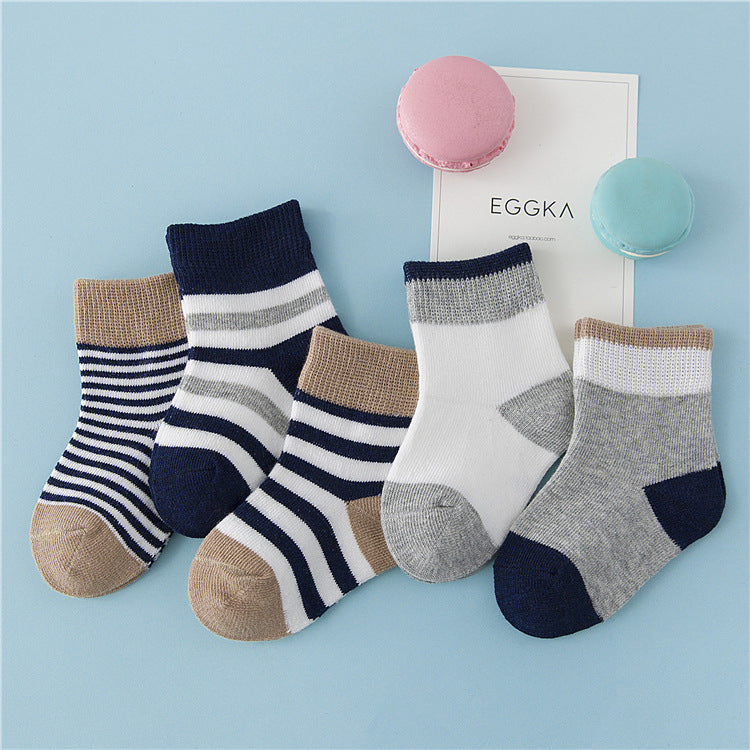 Children's winter cotton striped socks in navy, tan, and gray with ribbed cuffs