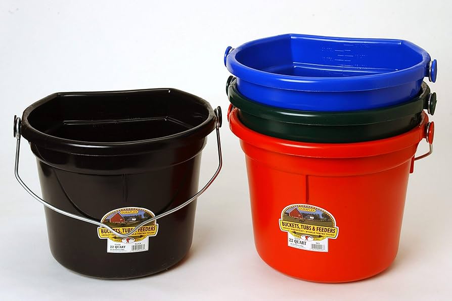 Set of plastic feed buckets in black, green, blue, and red with metal handles.