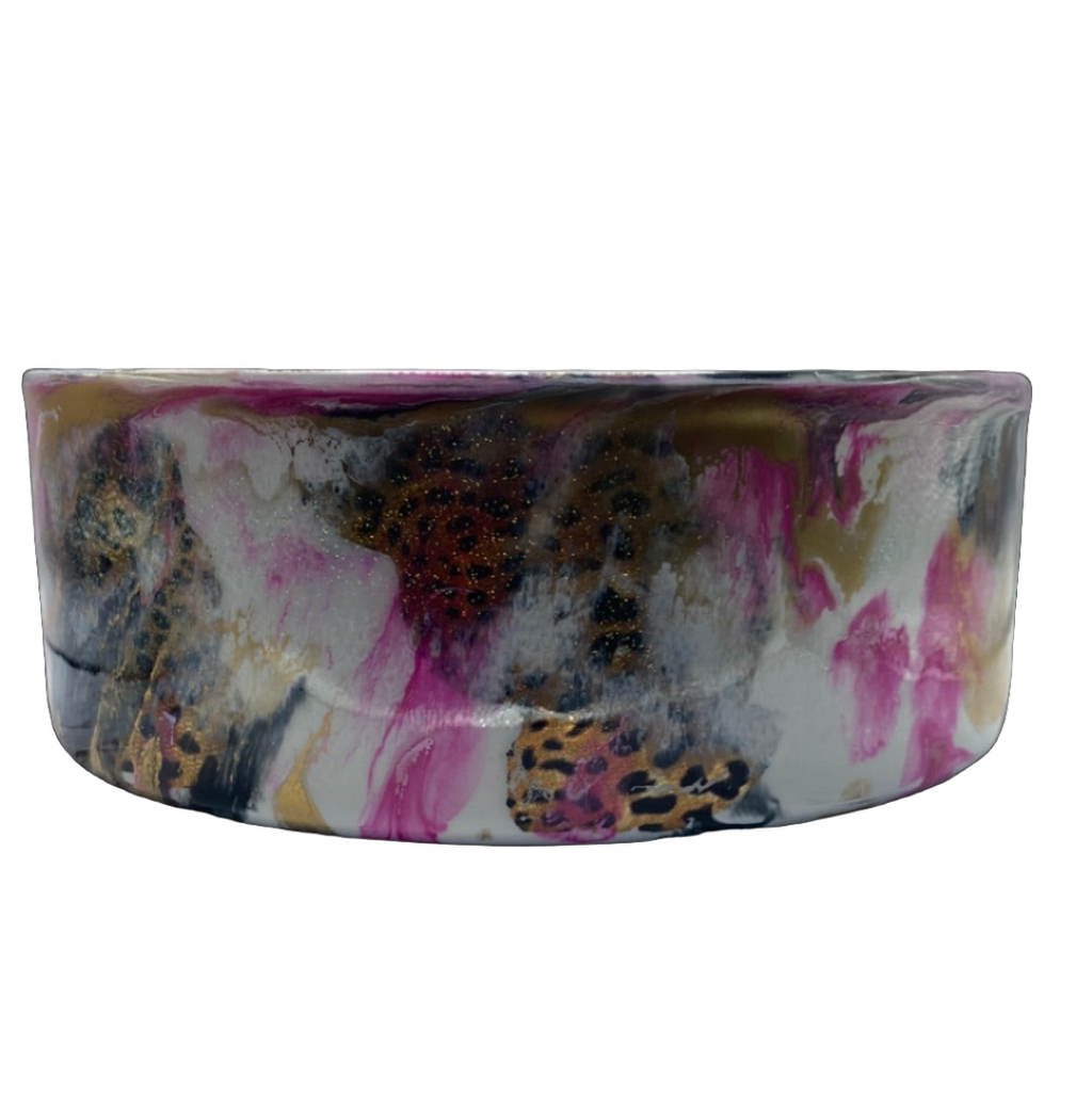 Stainless steel dog bowl painted with pink, black, and cheetah spots