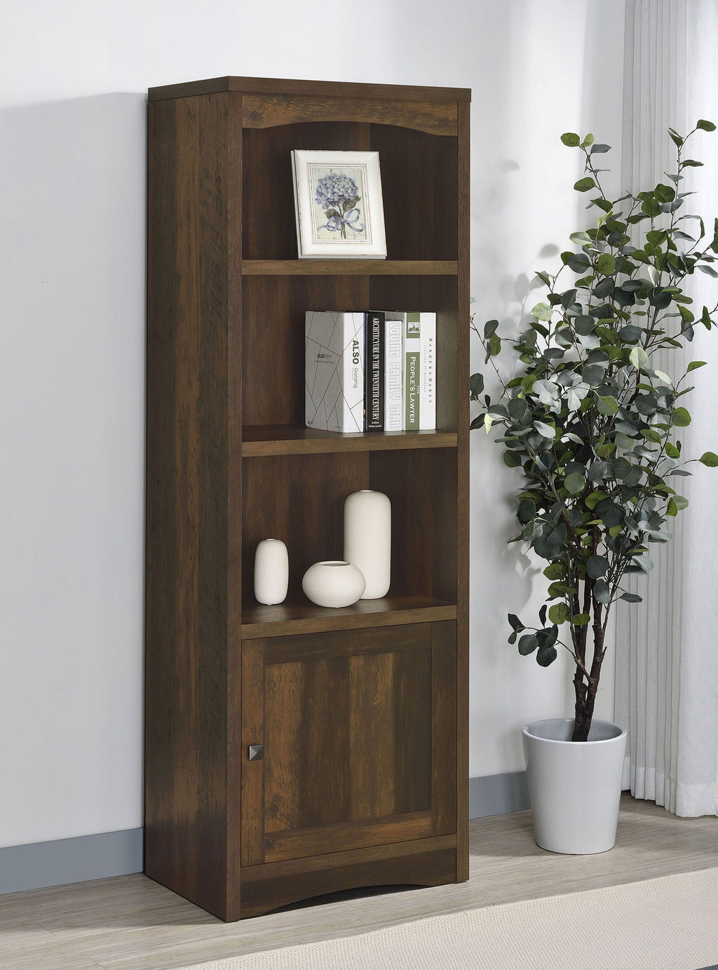 Dark pine media tower with open shelves, lower cabinet door, and arched top frame