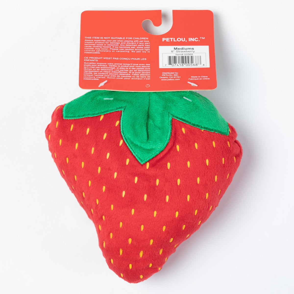 Plush strawberry dog toy back with green top and yellow seed dots; hang loop.
