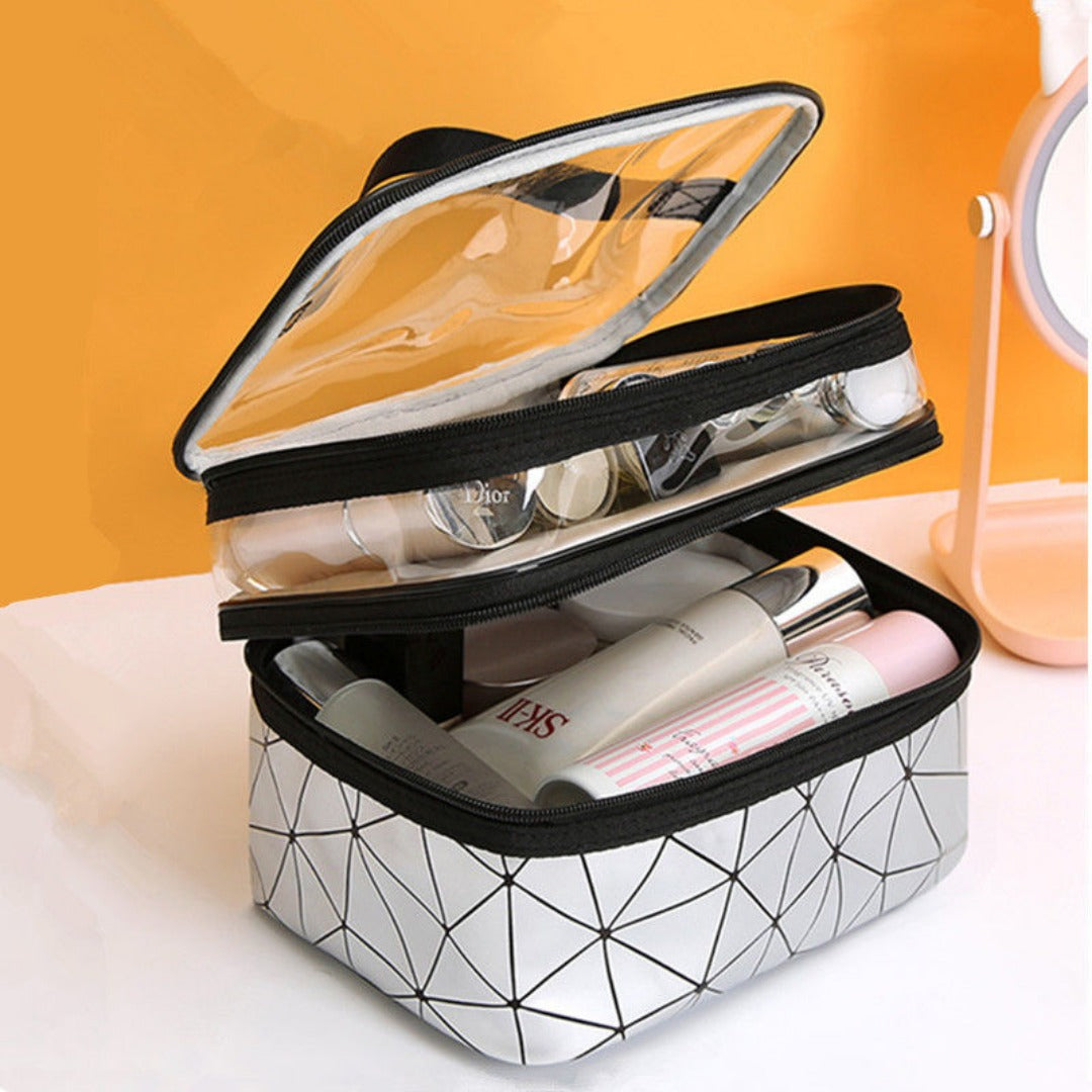 Double cosmetic bag in white with geometric pattern, clear top and black zipper