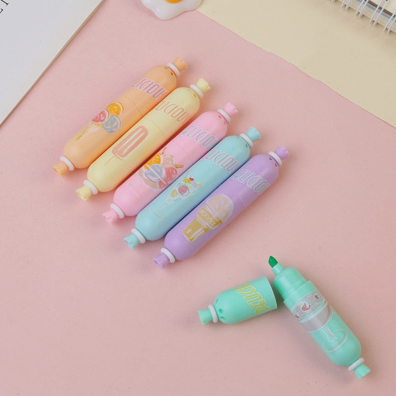 Assorted pastel capsule mini highlighter markers with cartoon face prints and nibs